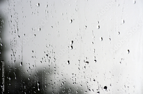 Rain drops on window glasses surface.