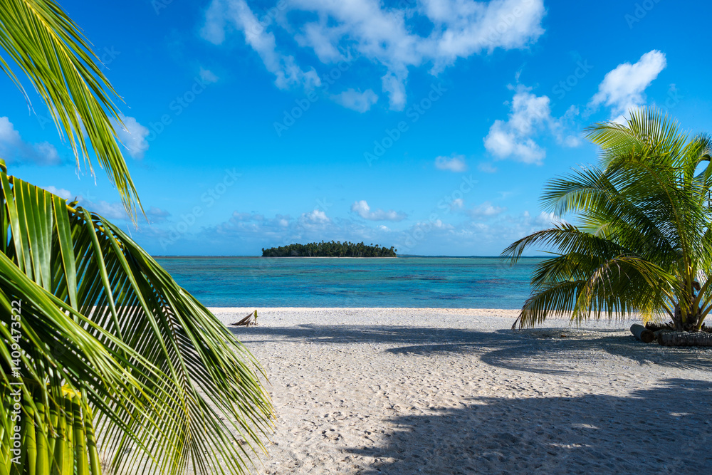Idyllic motu view from a beach in Tikehau, French Polynesia