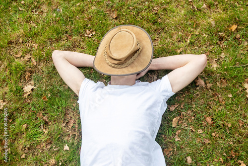 Teenage Boy Napping On Grass