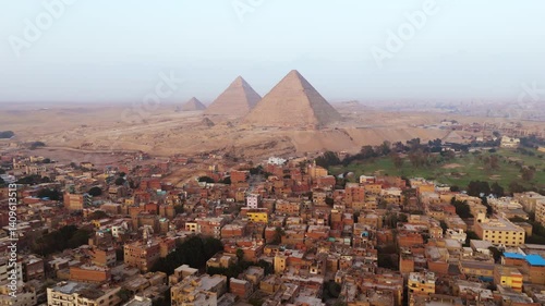 Panorama Of Giza City With The Pyramids of Giza In The Background In Egypt. Aerial Drone Shot