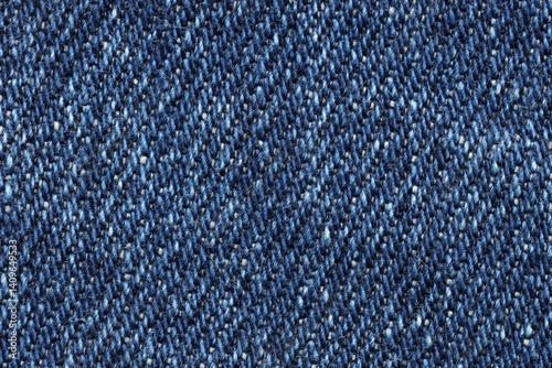 Obraz na płótnie Texture of blue denim fabric as background, closeup, top view w salonie