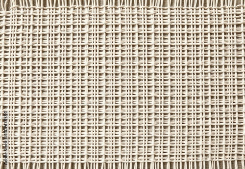Linen threads in a simple over-under weave, frayed and natural-colored Generative AI