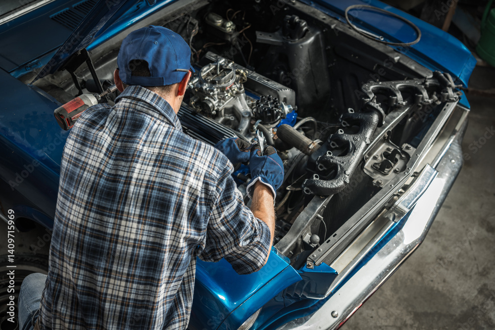 Car Mechanic Repairing Engine in Automotive Workshop