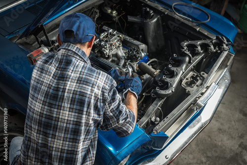 Obraz na płótnie Car Mechanic Repairing Engine in Automotive Workshop w salonie