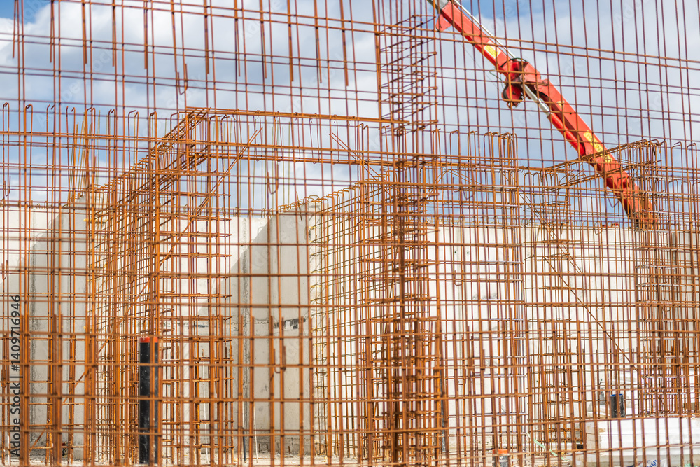 Construction Site With Crane and Steel Reinforcement Beams