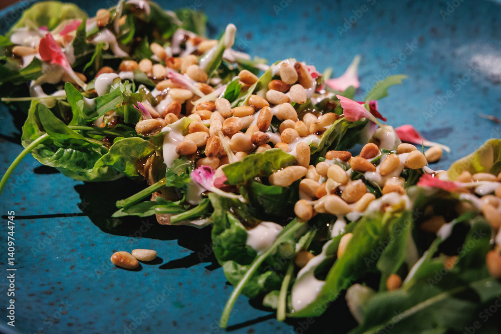Salad with Pine nuts in restaurant in Funchal city, capital of Madeira Island, Portugal