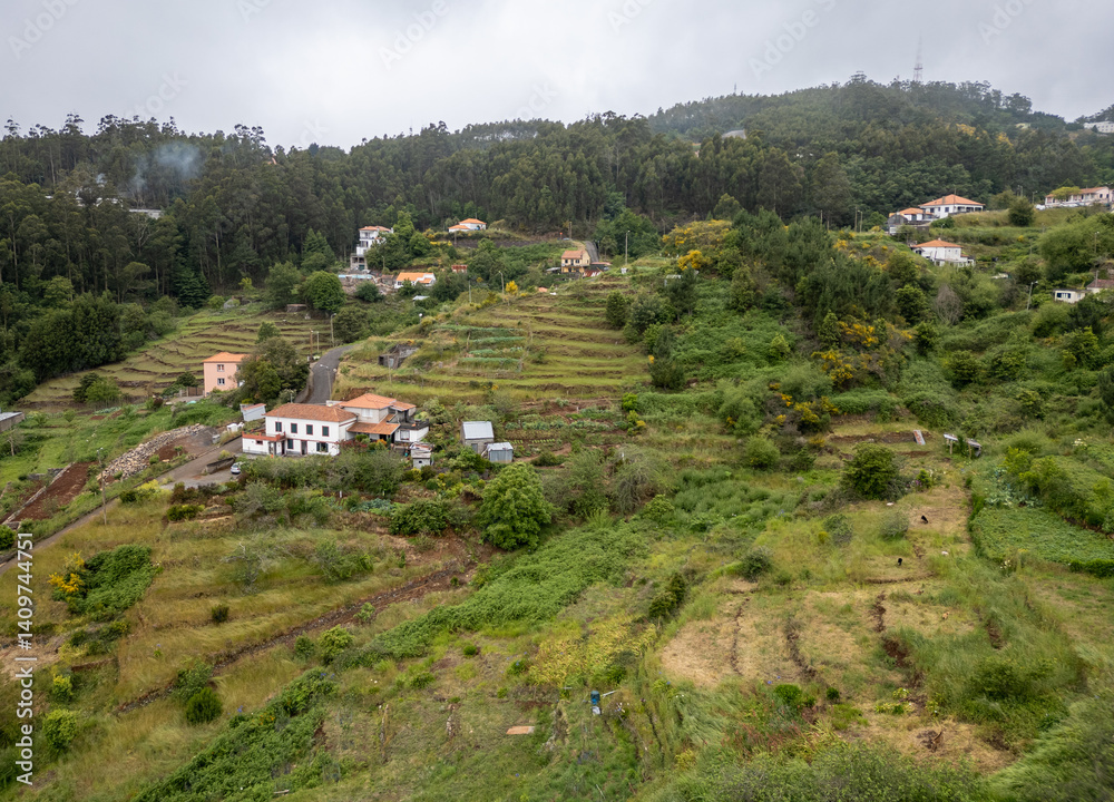 Aerial drone view in Camacha mountainous town in municipality of Santa Cruz, Madeira Island, Portugal