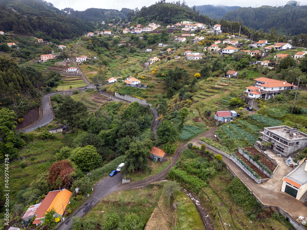 Aerial drone view in Camacha mountainous town in municipality of Santa Cruz, Madeira Island, Portugal
