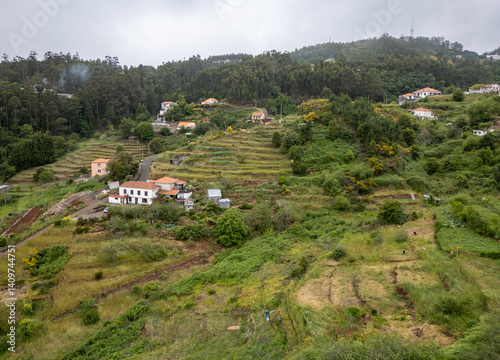 Aerial drone view in Camacha mountainous town in municipality of Santa Cruz, Madeira Island, Portugal