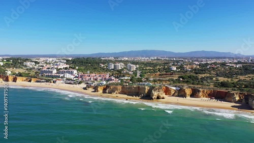 Wallpaper Mural The city of Albufeira borders its cliffs facing the ocean, in Europe, Portugal, Algarve, in summer, on a sunny day.  Torontodigital.ca