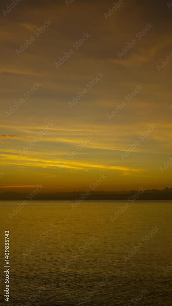 Sea surface during a beautiful colourful sunset, timelapse. Vertical video 4k Sea surface during a beautiful colourful sunset, timelapse. Vertical video 4k
