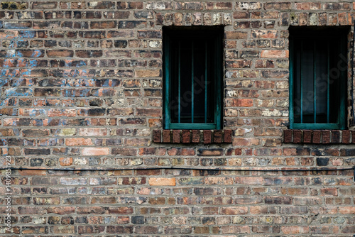 alley window in a brick wall