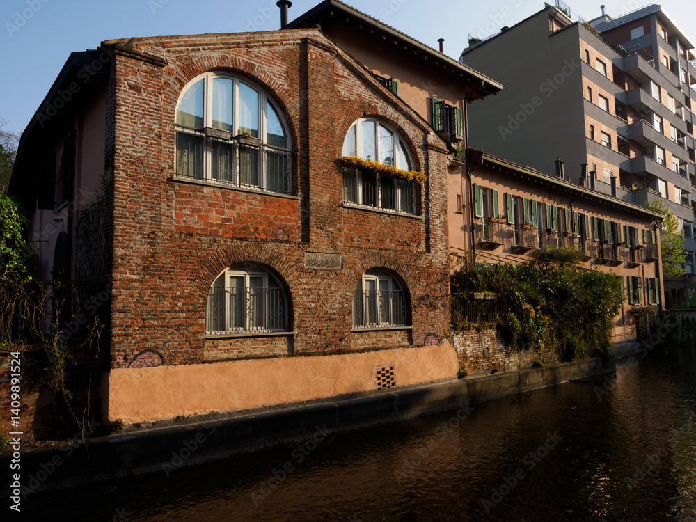 Old buildings along the canal Martesana at Milan, Italy