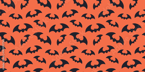 Vector Halloween pattern. Black bats on orange background. Seamless. Flat spooky style. Use for wrapping, textiles, wallpapers, party decor