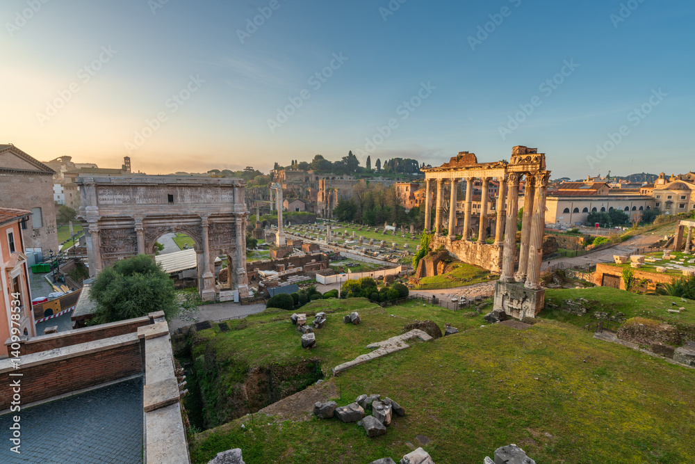 Roman forum ruins at sunrise in Rome. Italy