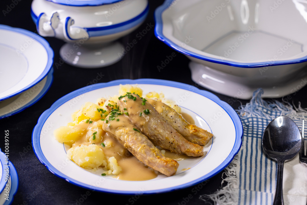 rabbit with cream sauce and mashed potatoes