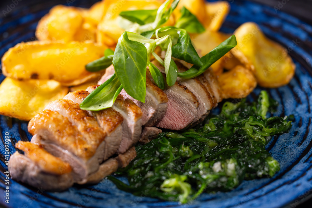 roasted duck breast with spinach and potato chips