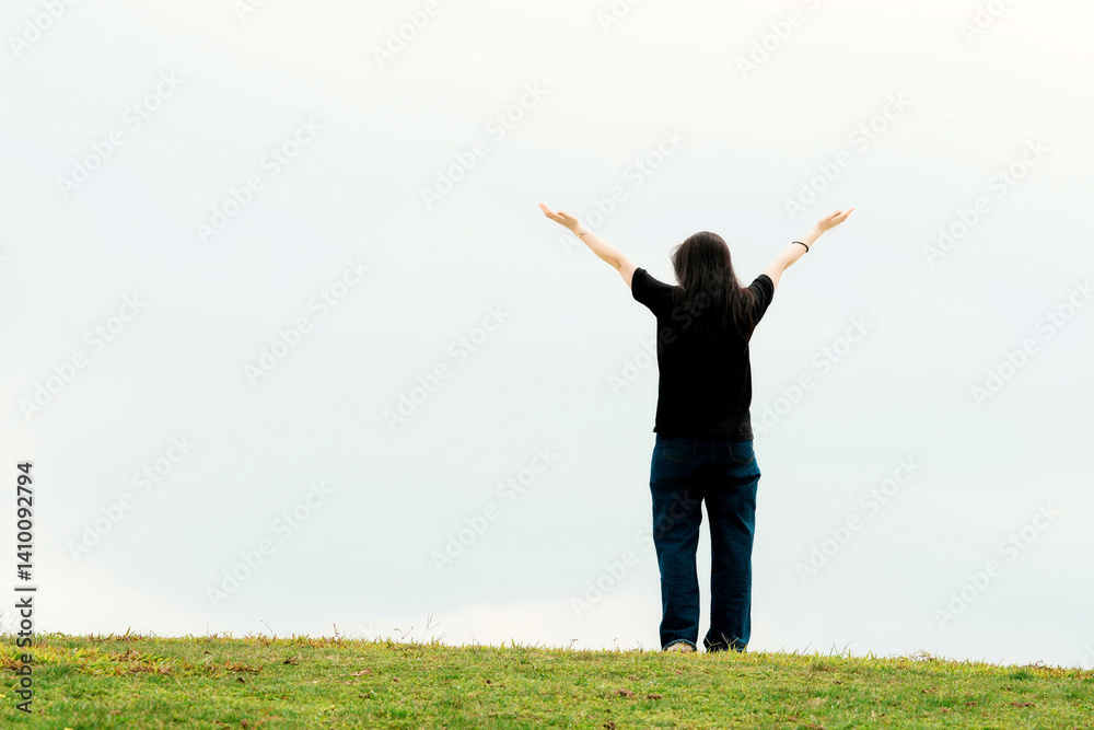 Embracing Freedom: A Silhouette of Joy Against a Calm Sky Embracing Freedom: A Silhouette of Joy Against a Calm Sky