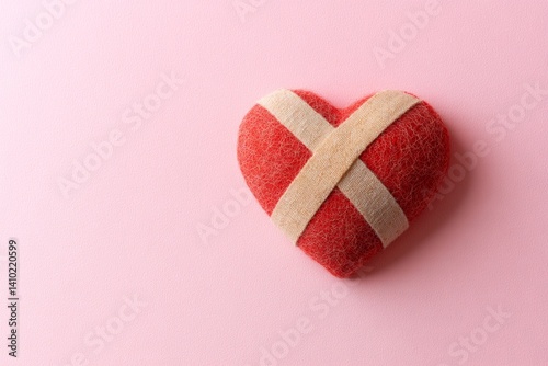 Wounded heart on pink background (3)
