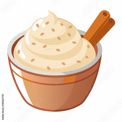 A cup of coffee topped with cinnamon, accompanied by a silver spoon resting beside it on a wooden table.