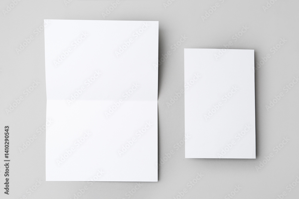 Blank greeting cards on light background, flat lay Blank greeting cards on light background, flat lay