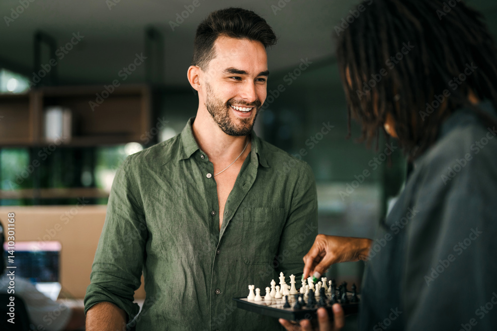 Two business people play chess and move chess pieces. Business management competition and leadership