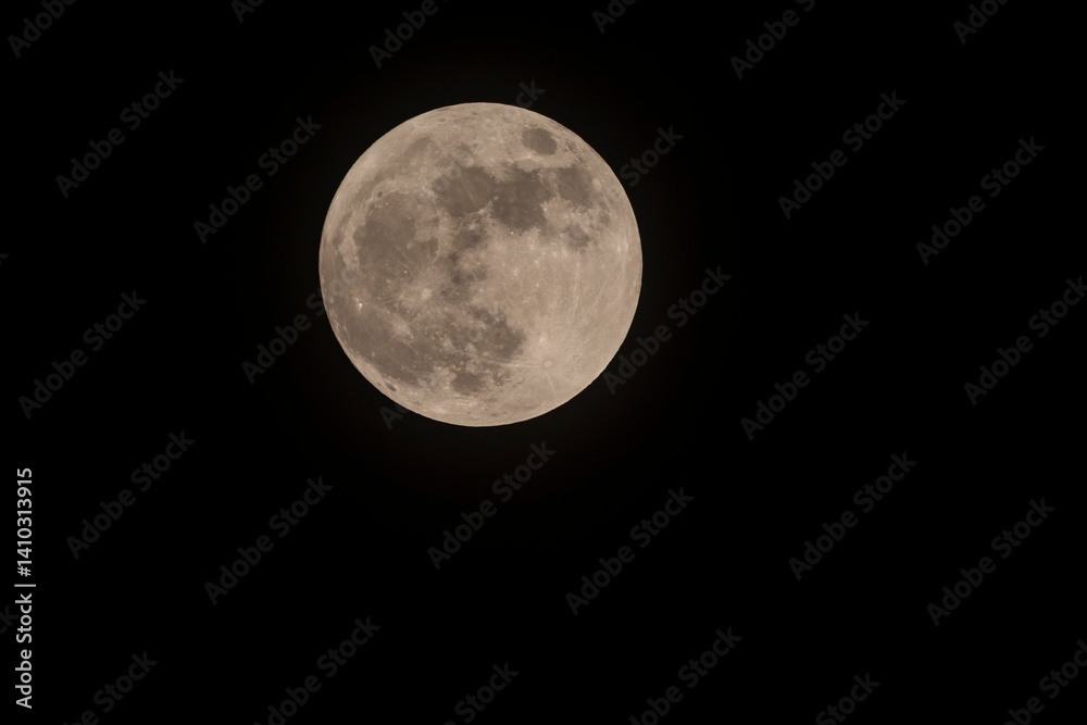 Pink full moon in Libra on April 13, 2025, glowing brightly in the night sky with detailed surface features visible. Pink full moon in Libra on April 13, 2025, glowing brightly in the night sky with detailed surface features visible.