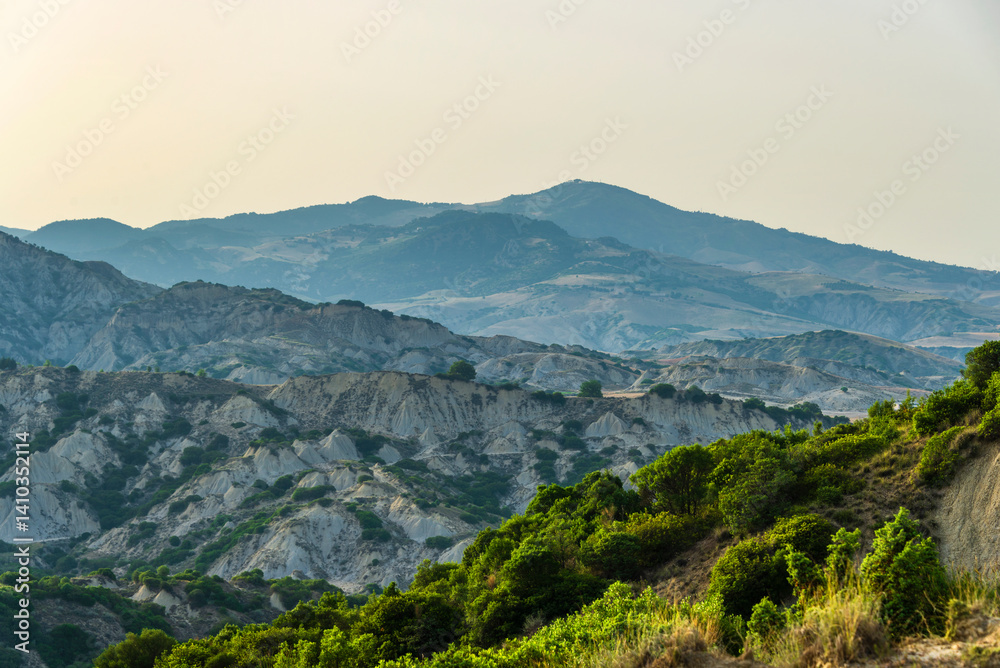 Fototapeta premium rural countryside landscape inside the badlands national Park during a sunny summer day, Val d'Agri, Basilicata