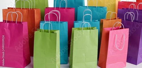 Obraz na płótnie Colourful paper shopping bags isolated on white background w salonie