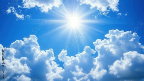 Clear blue sky with puffy white clouds and a bright sun