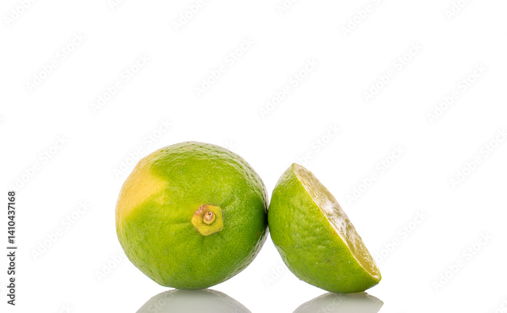 Several juicy limes isolated on white background, close-up. Several juicy limes isolated on white background, close-up.