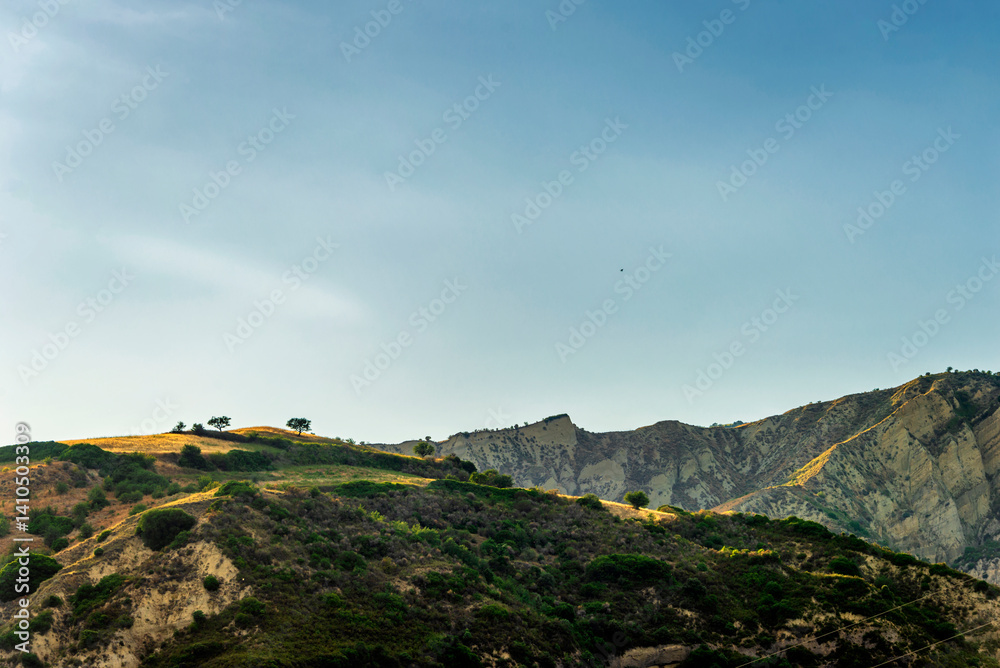 Fototapeta premium rural countryside landscape during a sunny summer day inside Val d'Agri, Basilicata