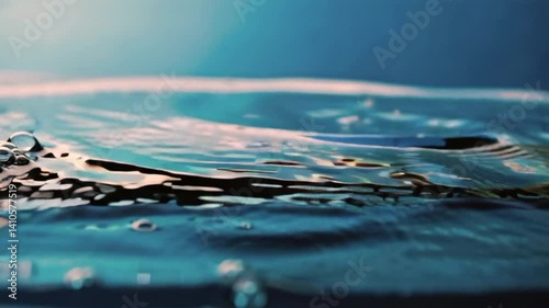 Water surface splashing and rippling with light background