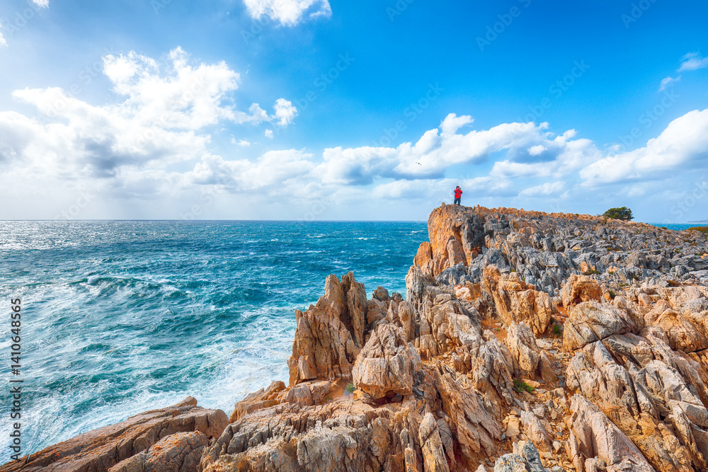 Unbelivable view of cliffs in valley Cala Domestica and storm on the sea