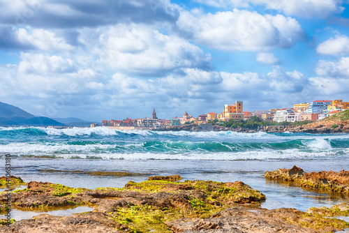 Astonishing spring cityscape of Alghero town at morning.