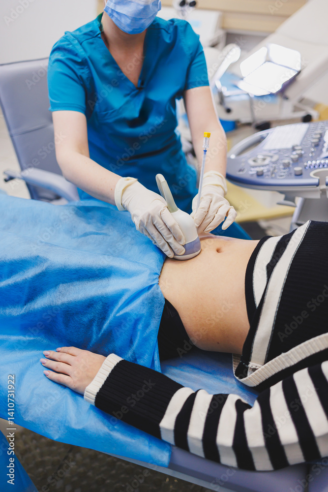 Shot of a pregnant woman during an ultrasound scan in a fertility clinic. Examination healthcare pregnancy gynecology people professionalism trust