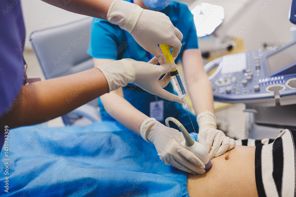 Woman lying near doctor during pregnancy ultrasound. Checking pregnant woman during pregnancy disturbance