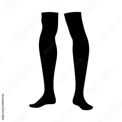 Black thigh high socks or stockings on legs stand close together