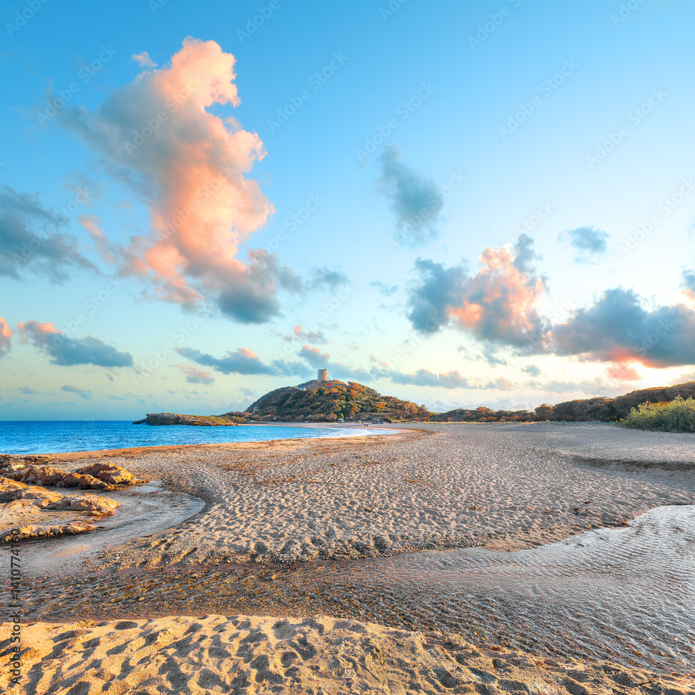 View of beautiful Chia bay and wonderful beach with Torre di Chia tower.