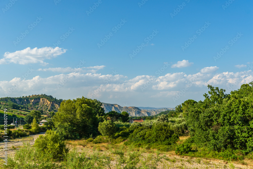 Obraz premium rural countryside landscape during a sunny summer day inside Val d'Agri, Basilicata