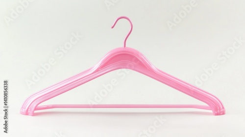 A single pink plastic clothes hanger, isolated on a white background, highlighting its practical and functional design