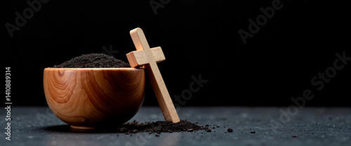 Ashes in a Wooden Bowl with a Cross on a Black Background  