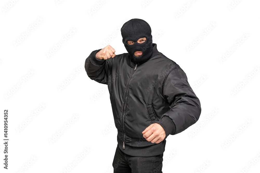 Masked criminal getting ready to punch someone Masked criminal getting ready to punch someone