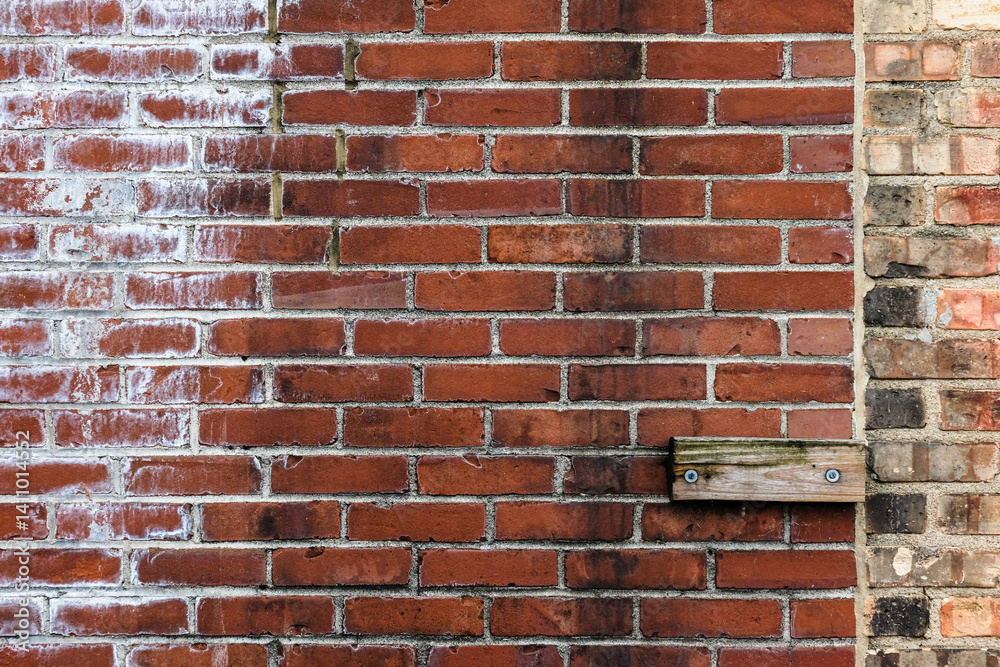 red brick wall with white paint and wood red brick wall with white paint and wood
