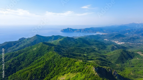 High Angle View Of Lush Green Mountains And Coastal Ocean