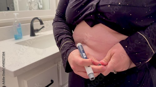 GLP-1 Weight Loss Prescription Medication Has Become Super Popular, Expensive, and Difficult to Obtain - Woman Giving Herself a Shot at Home