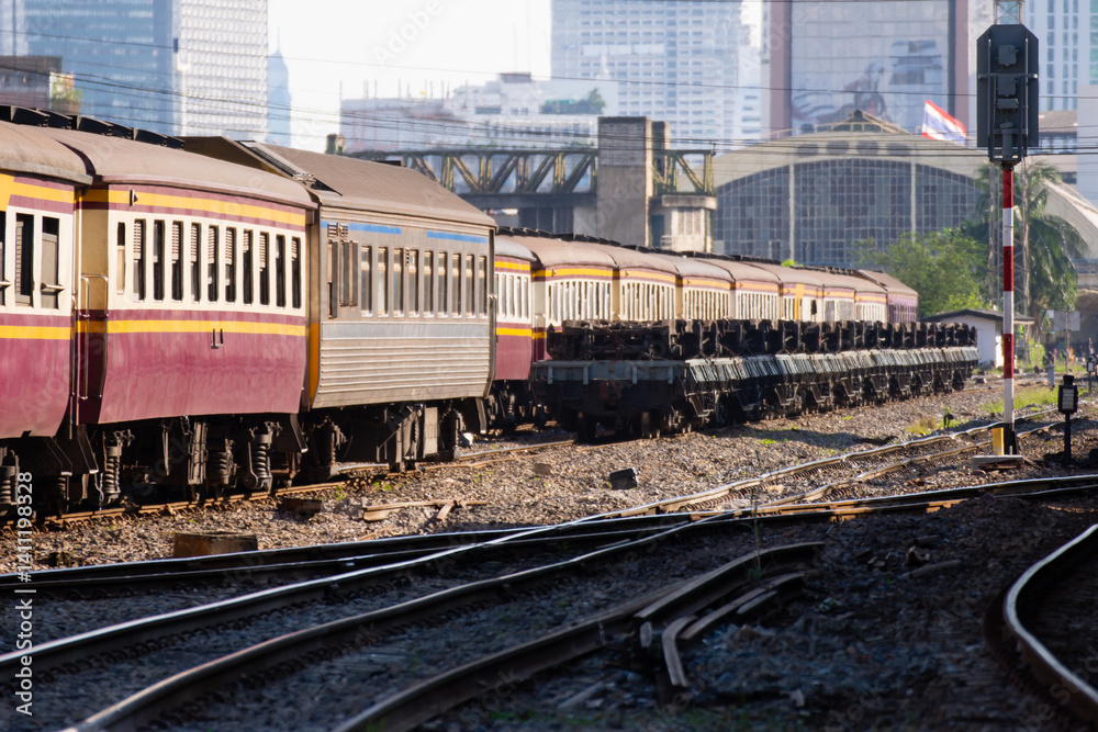 Thai railway train with locomotive runs in Bangkok Thai railway train with locomotive runs in Bangkok
