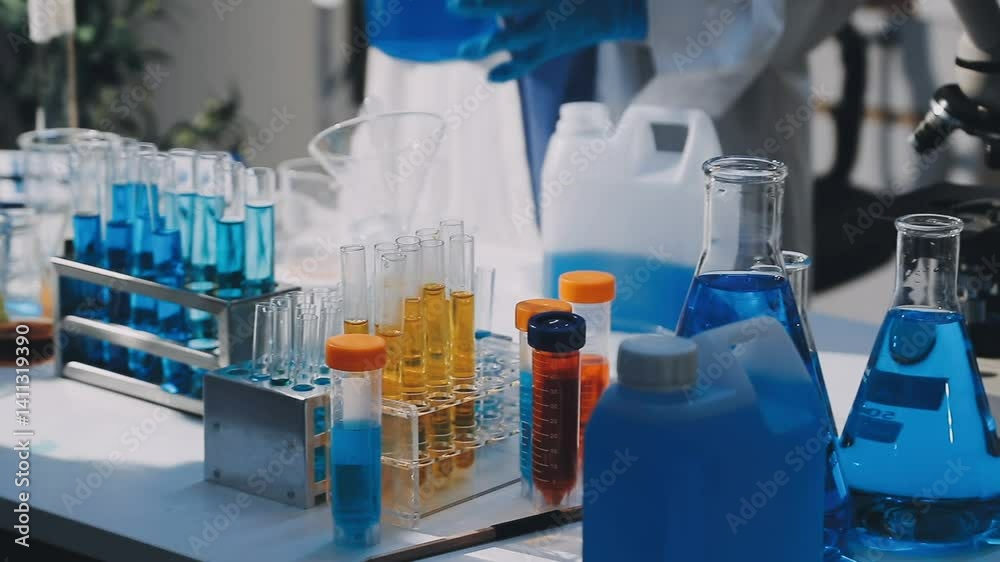 Scientist analyze biochemical samples in advanced scientific laboratory. Medical professional use microscope look microbiological developmental of viral. Biotechnology research in science lab.