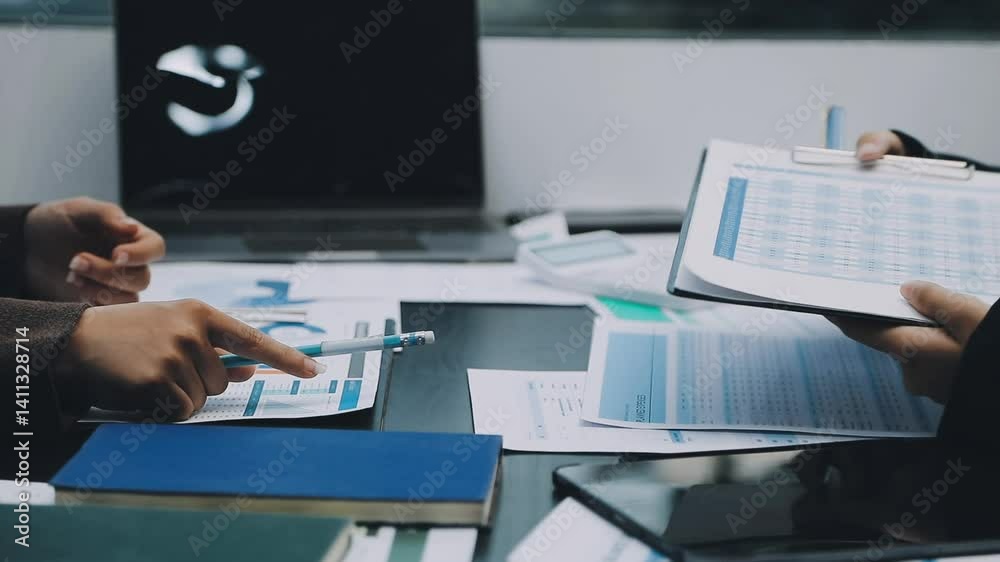Auditor and accountant team working in office, analyze financial data and accounting record with calculator. Accounting company provide finance and taxation planning for profitable cash flow.