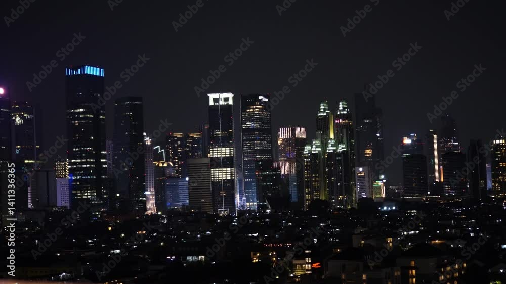 Night Cityscape Glowing with Building Lights in Urban Skyline View Night Cityscape Glowing with Building Lights in Urban Skyline View